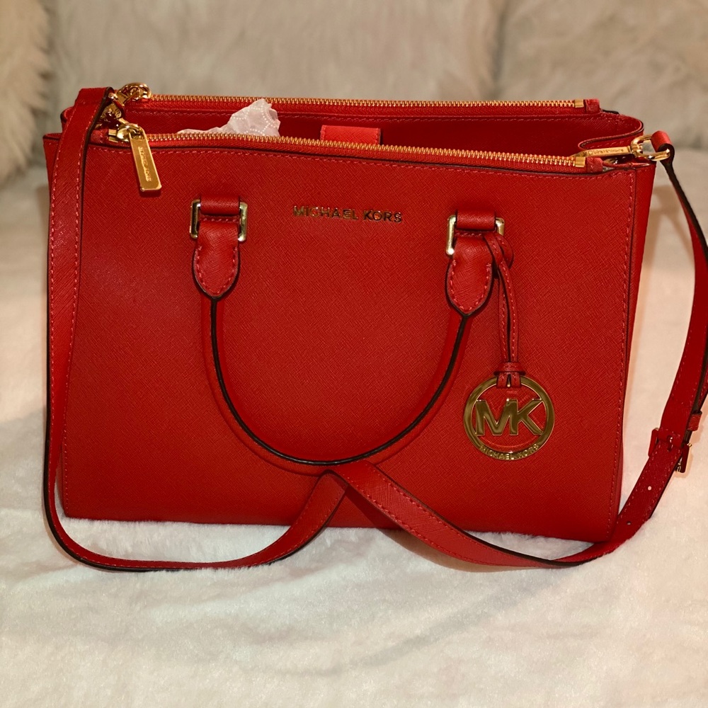 Red Michael Kors satchel